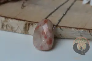 pierre soleil pendentif
